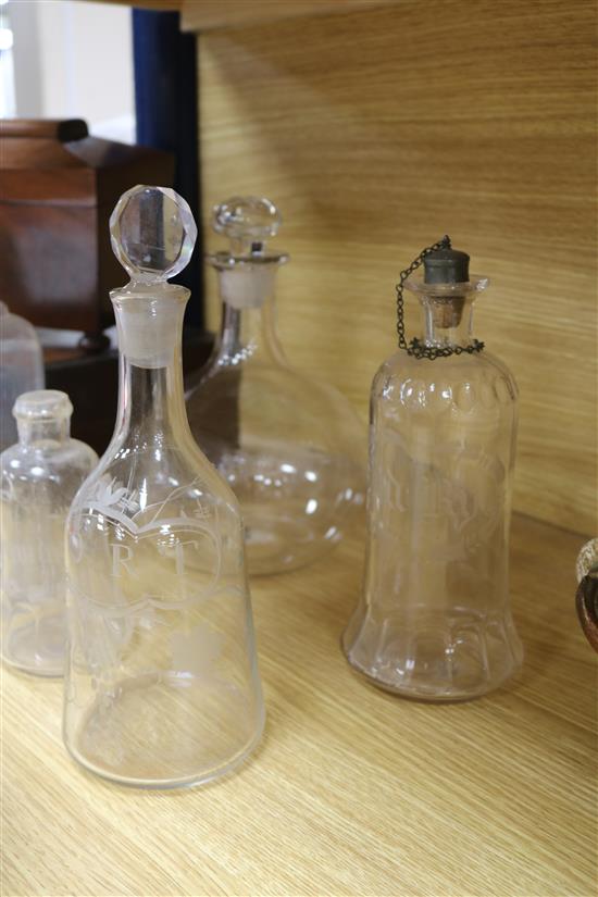 A quantity of glass decanters tallest 31cm